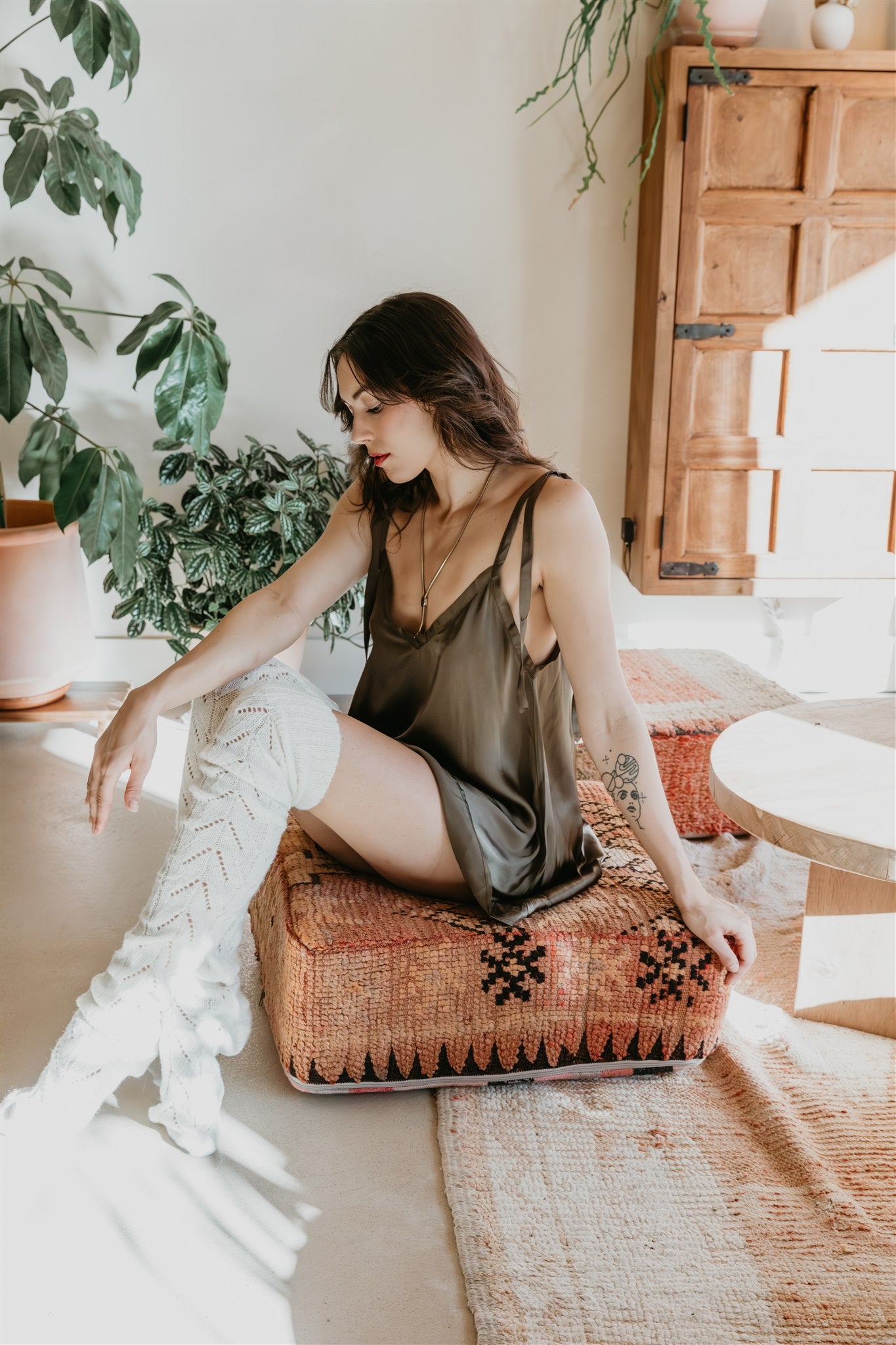 women wearing licorice viscose camisole with flowing A-line silhouette