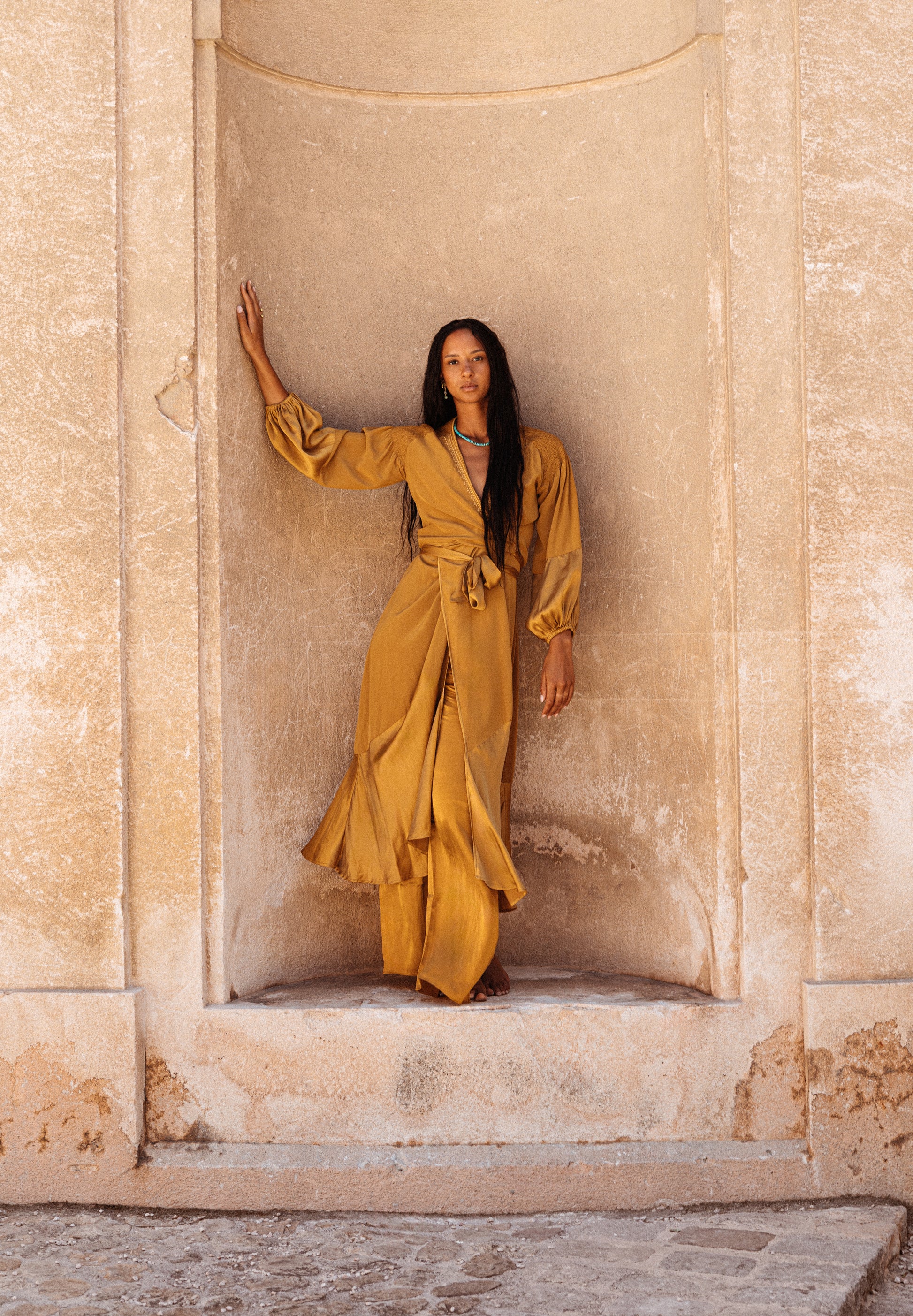 women wearing Bohemian silk wrap dress with balloon sleeves
