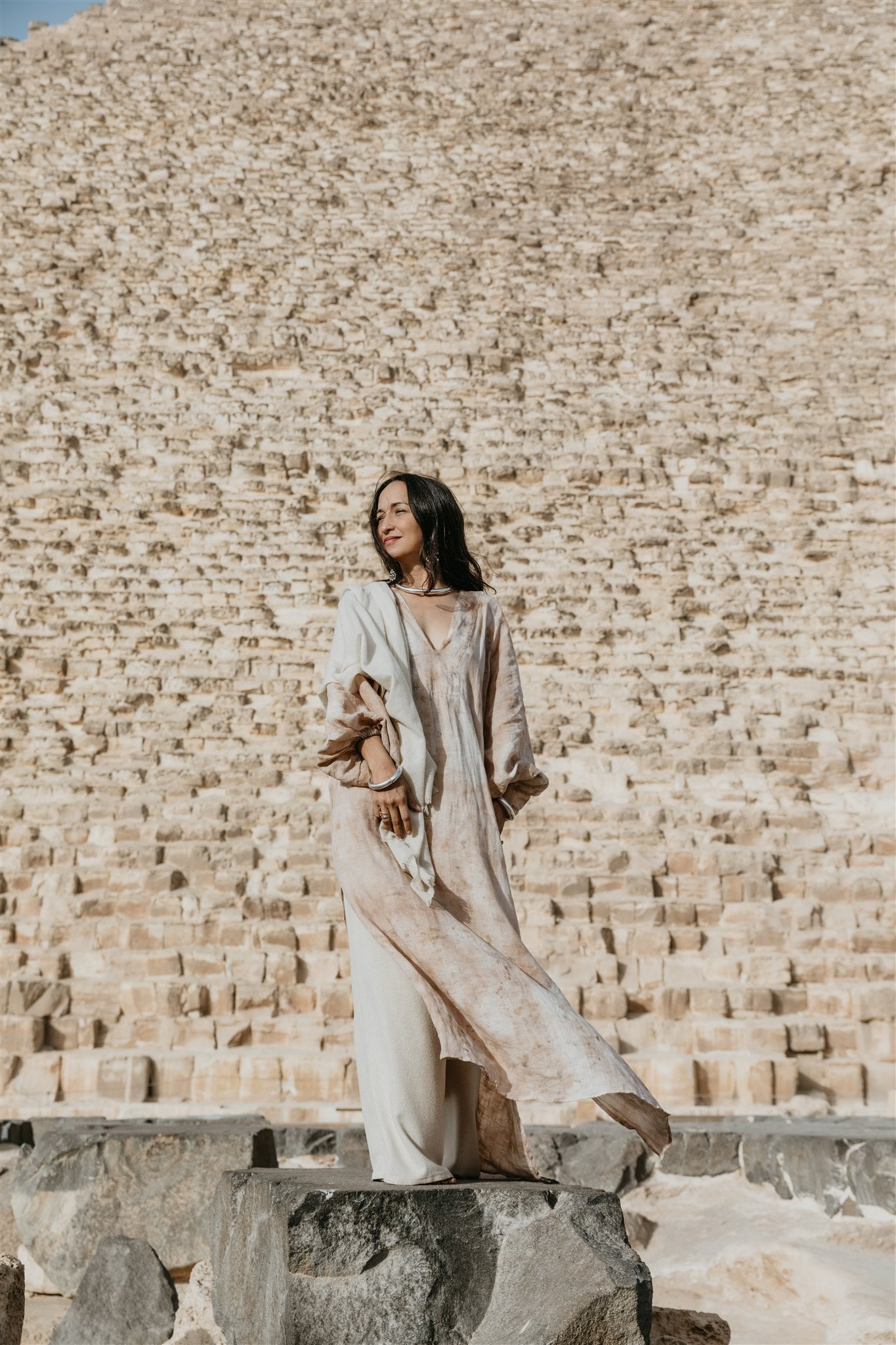 Model wearing Nomad Linen Kaftan botanical dyed linen dress by Payet Maison in a flowing bohemian silhouette.