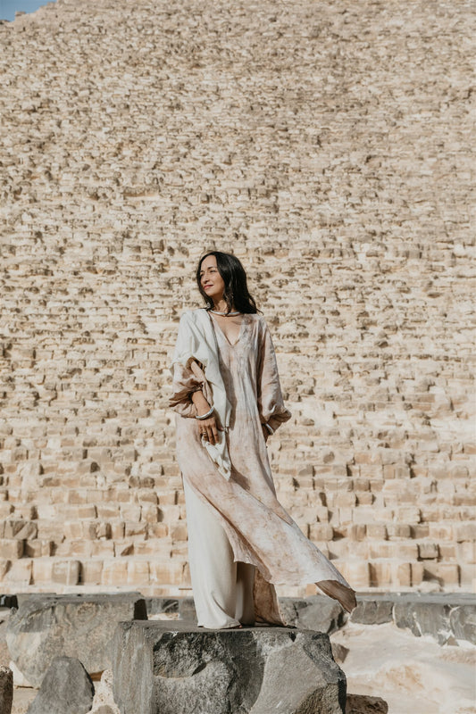 Model wearing Nomad Linen Kaftan botanical dyed linen dress by Payet Maison in a flowing bohemian silhouette.
