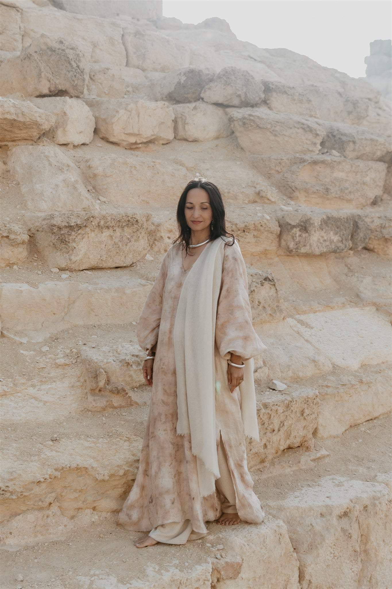 Model wearing Nomad Linen Kaftan by Payet Maison, a flowing botanical dyed linen dress with balloon sleeves.