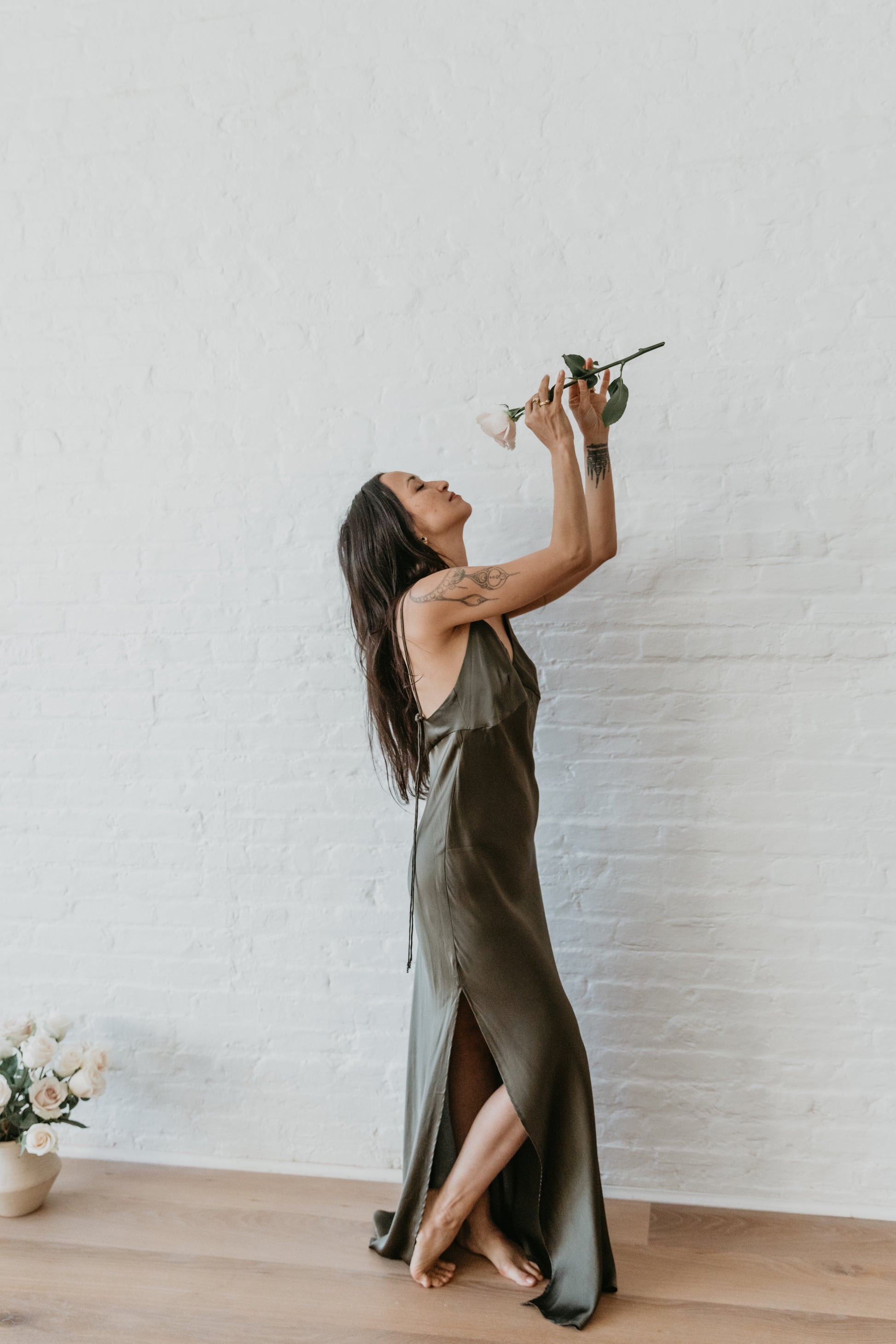 Ethical silk dress with Bedouin tattoo inspired embroidery
