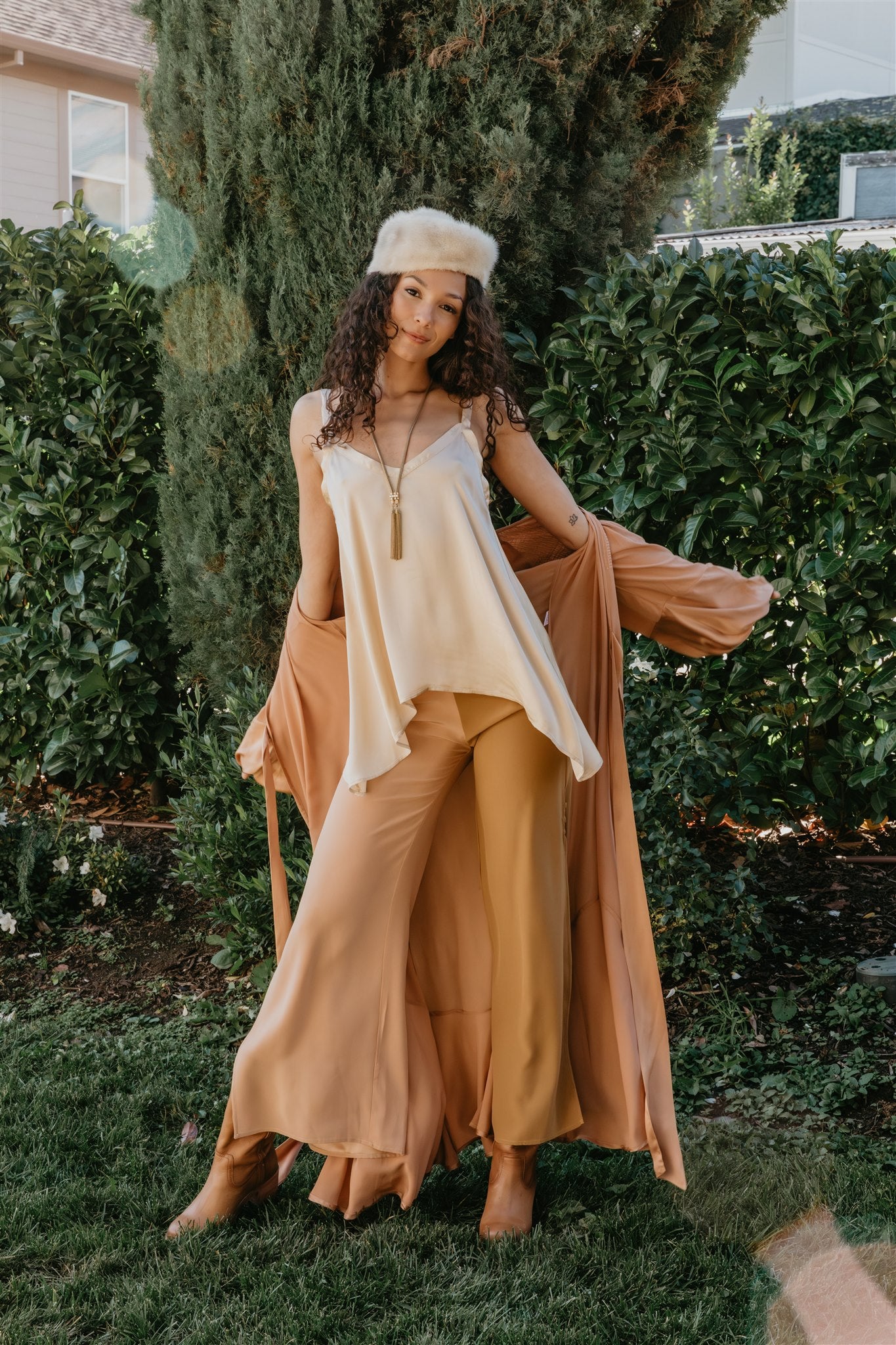 women wearing Wide leg silk pants with two-tone design