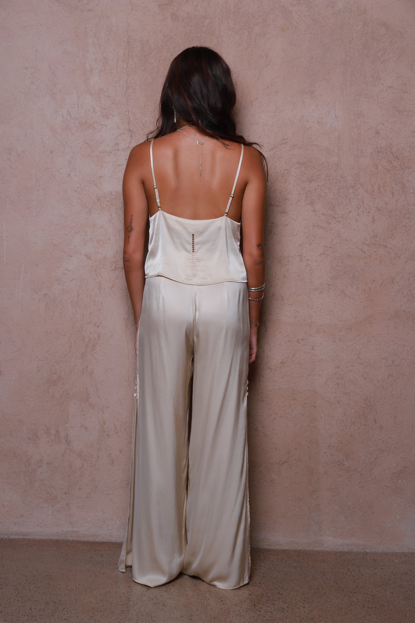 women in Relaxed fit silk pants with side slit detail,Luxury silk pants in neutral champagne tone