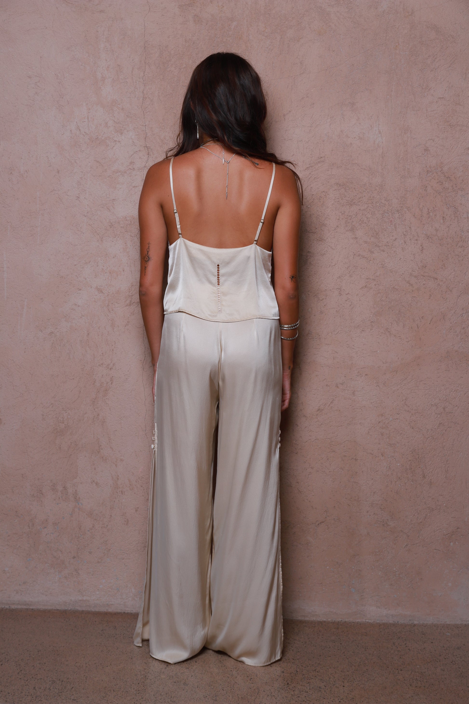 women in Relaxed fit silk pants with side slit detail,Luxury silk pants in neutral champagne tone