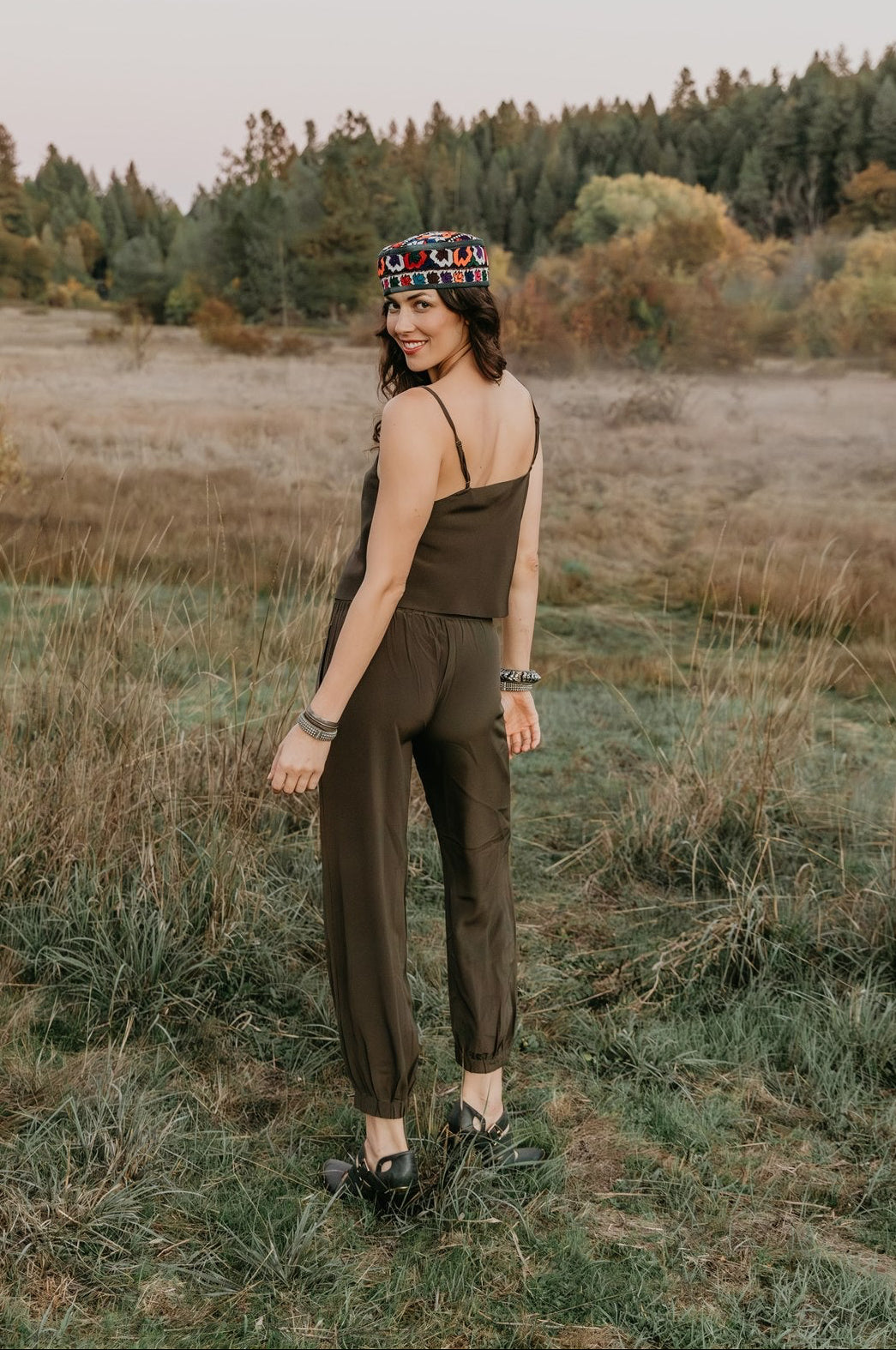 Flowing Zola silk trousers by Payet Maison styled with a relaxed silhouette and soft peace silk fabric