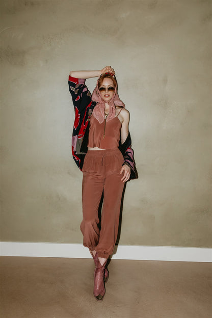Zola peace silk drawstring pants in Plum by Payet Maison, elegant flowing silk trousers in a relaxed silhouette.
