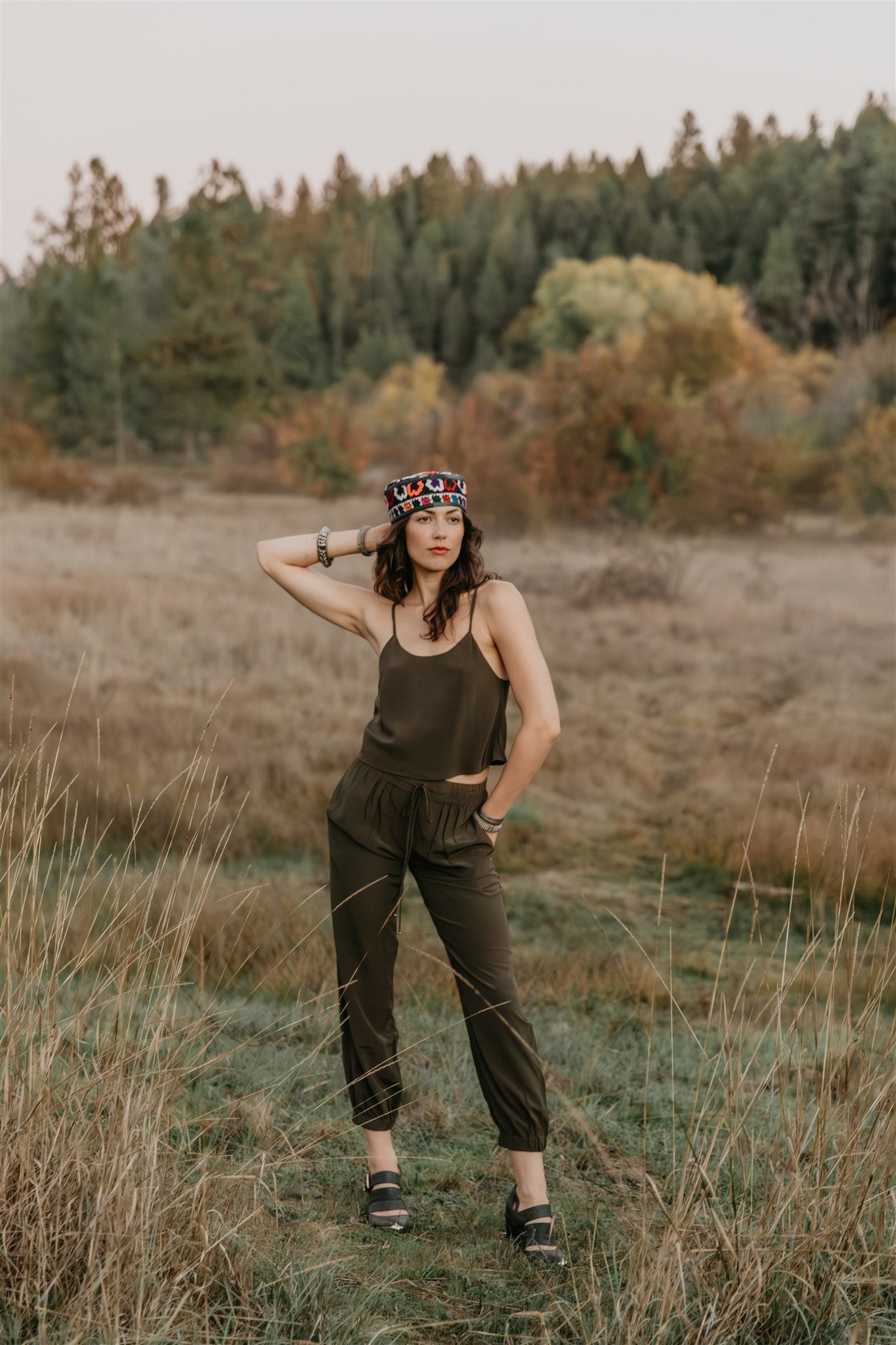 Model styling Zola peace silk pants by Payet Maison, elegant drawstring trousers designed for natural movement.
