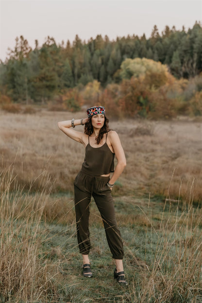 Model styling Zola peace silk pants by Payet Maison, elegant drawstring trousers designed for natural movement.
