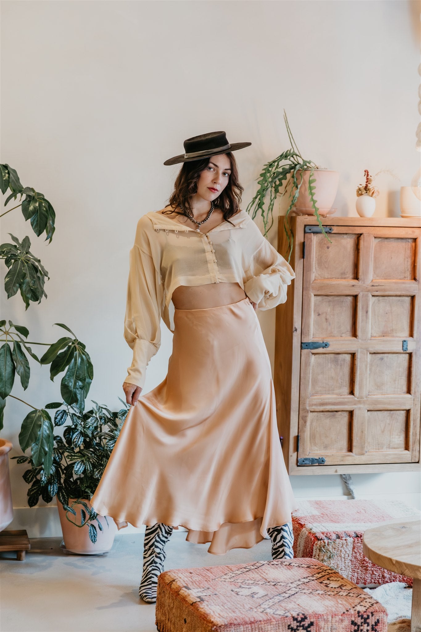 women wearing lightweight silk blouse with cuff buttons detail