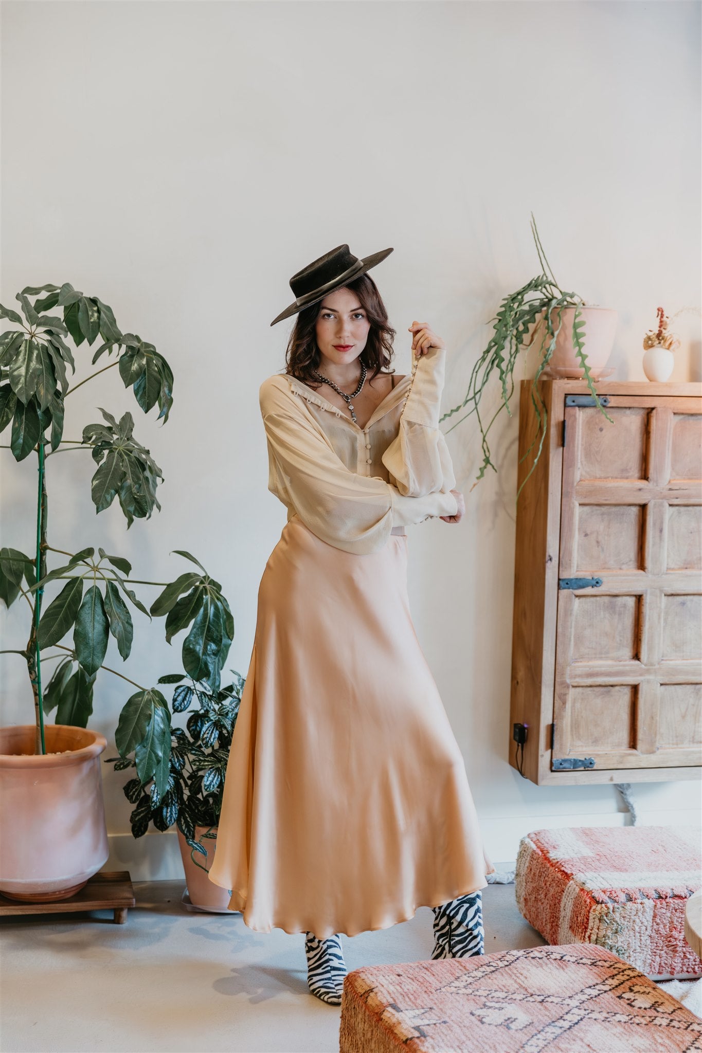 women wearing bohemian silk blouse soft draped silhouette and flow skirt