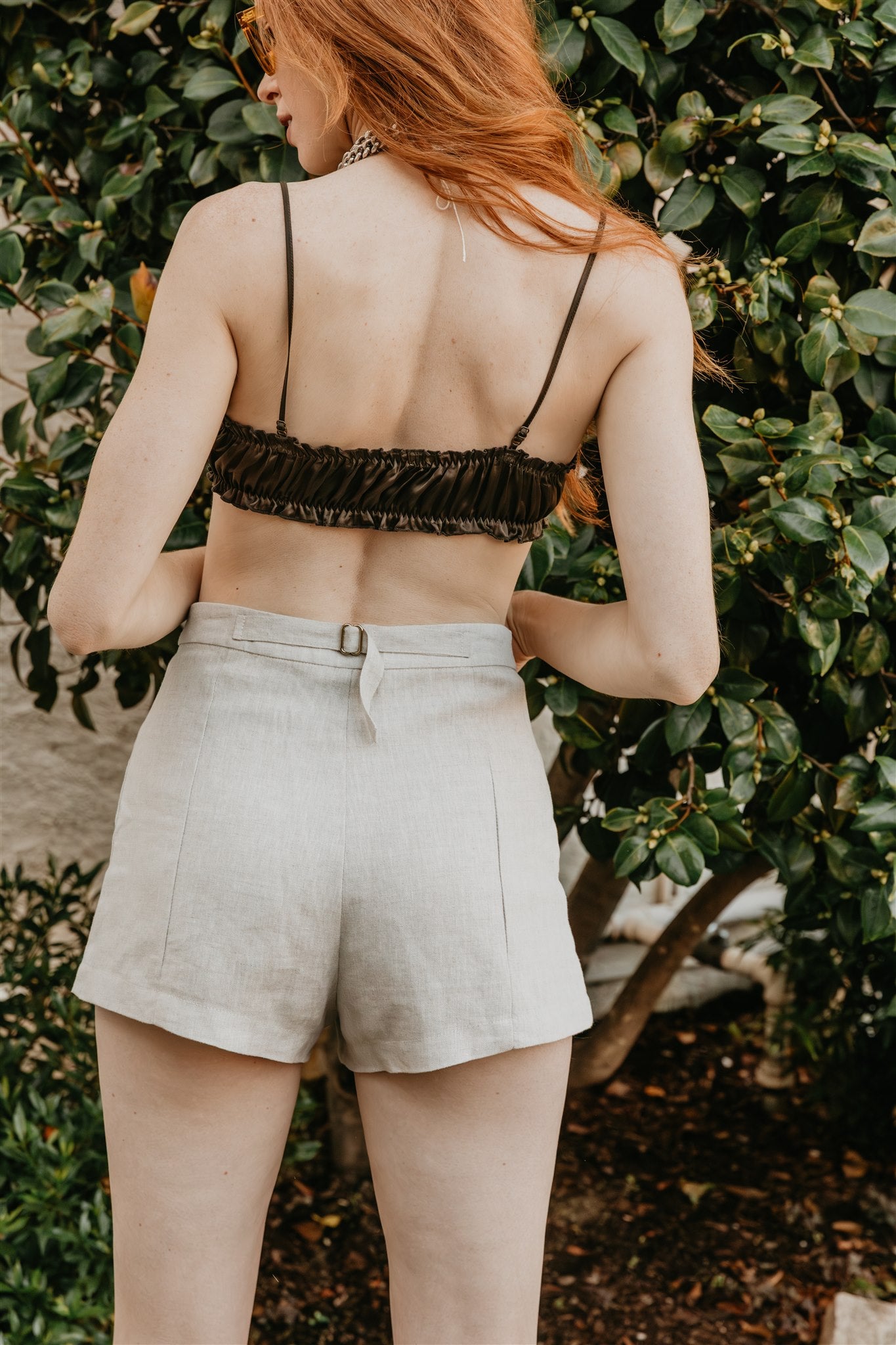 women wearing relaxed tailored linen shorts natural fabric
breathable linen shorts summer essential
