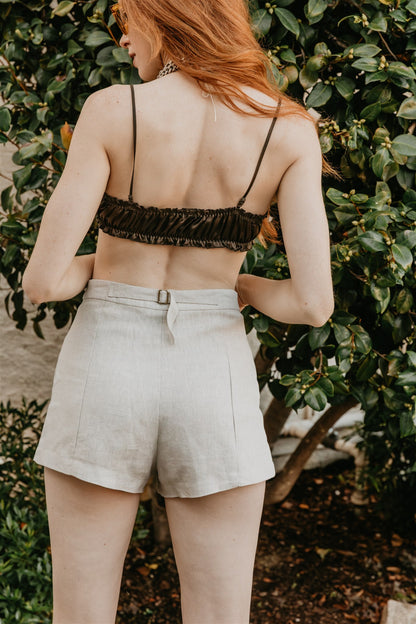women wearing relaxed tailored linen shorts natural fabric
breathable linen shorts summer essential
